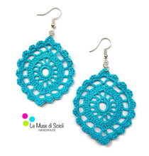 a turquoise pair of handmade crochet cotton oval shape flat drop earrings