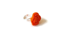 resizable floreal botanical inspired rose crochet ring in an orange color
