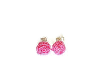 Pink stud earrings