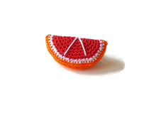 Red orange brooches