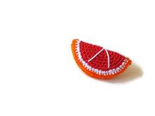 Red orange brooches